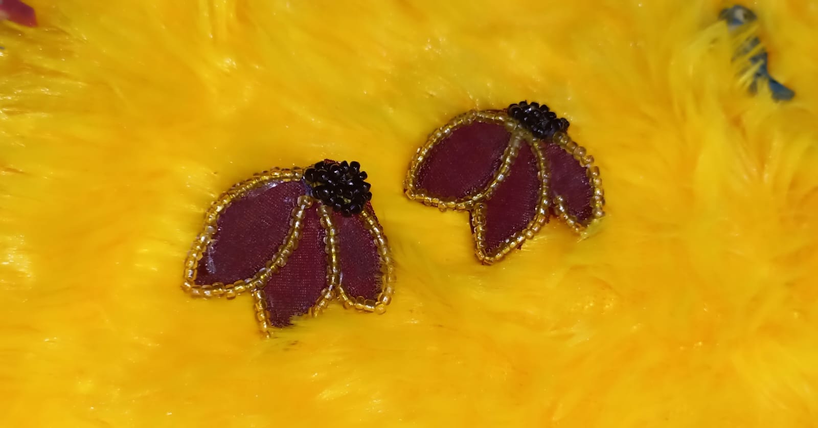 Handmade embroidered petal earrings
